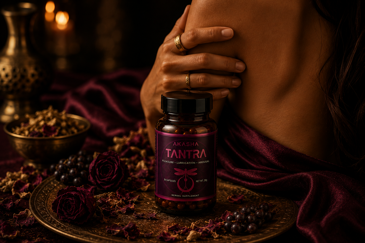 Akasha Tantra bottle beside a bare shoulder in warm plum light